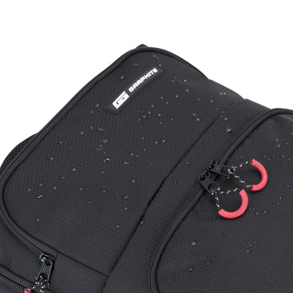 Close-up of the Graphite Metamorph Convertible Travel Backpack showing water droplets on top.