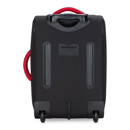 Standing upright on a white background, the Graphite Metamorph 21" Carry-on Wheeled Duffle from Graphite is a black, lightweight carry-on suitcase featuring a red handle and two wheels, ideal for outdoor adventures.