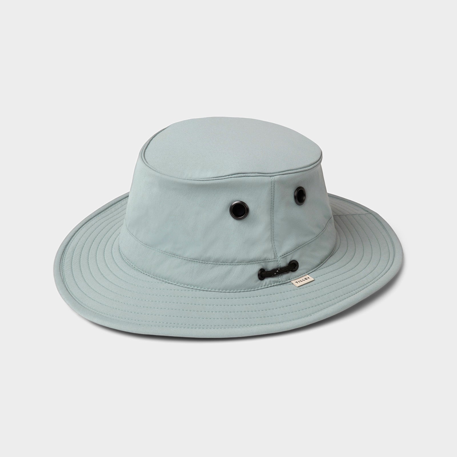 Tilley T5 Adventure Ultralight Hat: light mist blue, UPF 50+, wide brim, and ventilation eyelets.