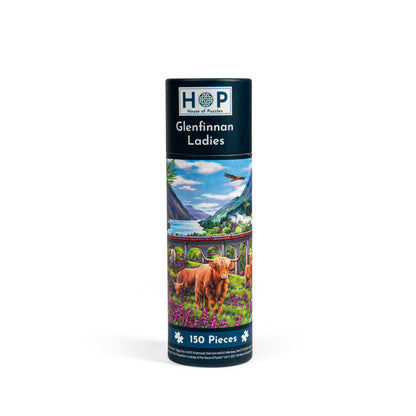 House of Puzzles 150 Piece Mini Jigsaw Puzzle Tube - Glenfinnan Ladies featuring Highland cattle and a train viaduct.