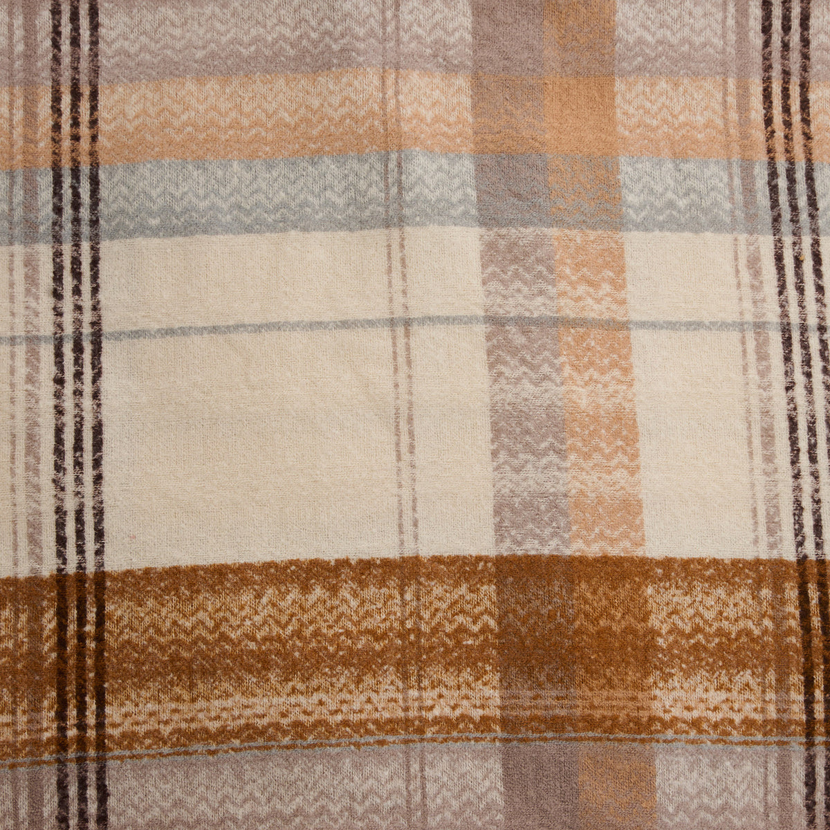 Close-up of a Howard’s Taupe Plaid Fringe Scarf in buttery soft taupe, tan, cream, and dark brown herringbone plaid.