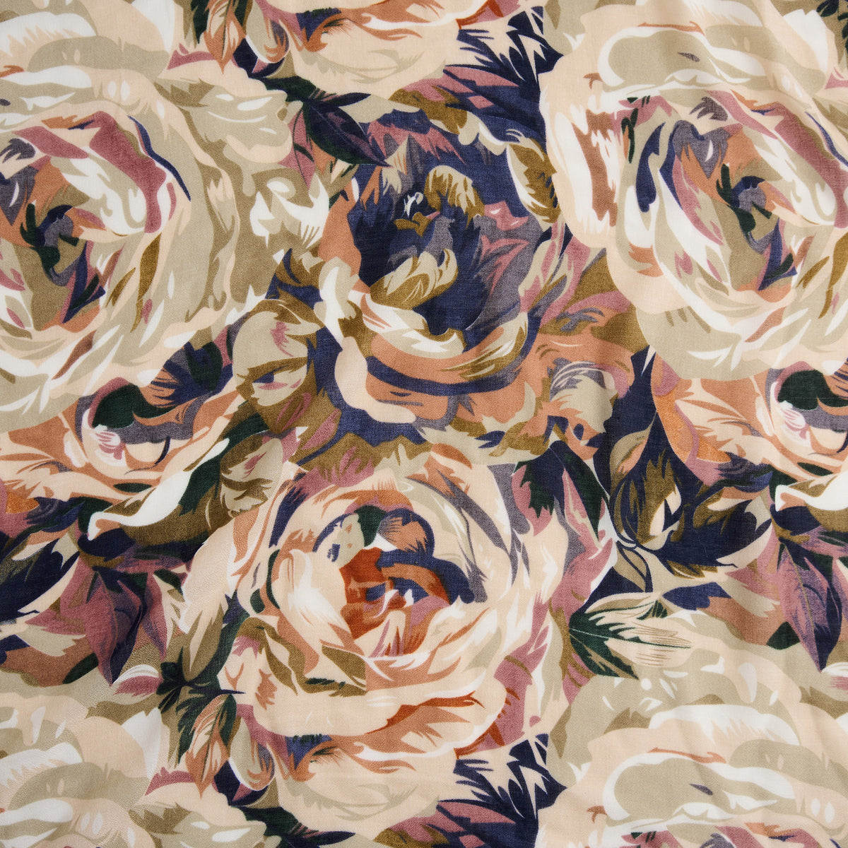 Howard’s Celina Rose Print Lightweight Scarf in muted pink, tan, cream, and navy with a stylized floral pattern.