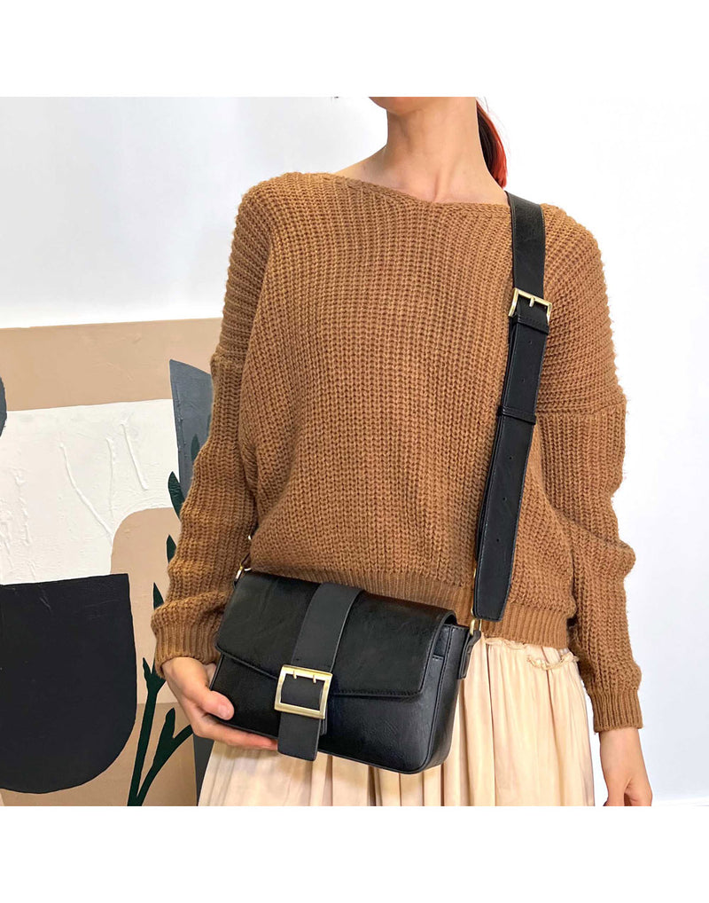 Woman wearing light brown sweater and the Espe Lee Crossbody in black