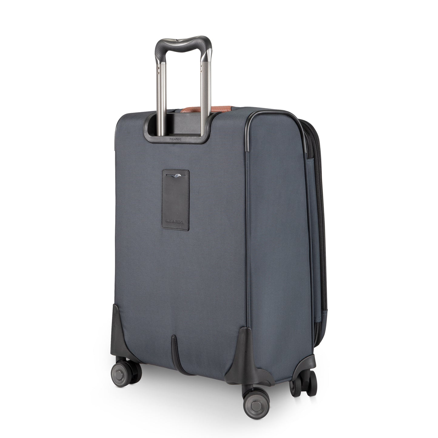 The Ricardo Beverly Hills Montecito 3.0 gray softside carry-on spinner stands upright with four wheels and an extended handle.