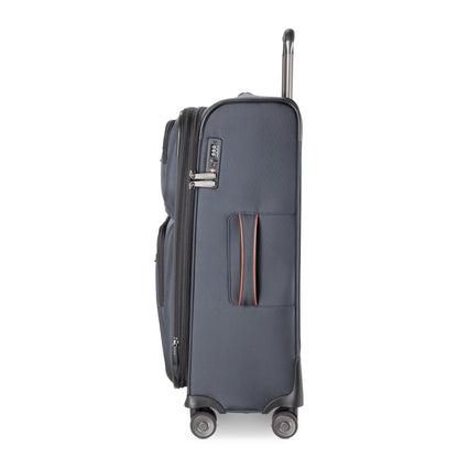 Ricardo Beverly Hills Montecito 3.0 medium navy softside luggage shown sideways with handle up, two zips visible.