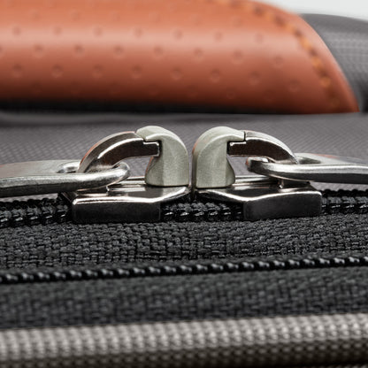 Close-up of silver zippers on the Ricardo Beverly Hills Montecito 3.0 Large Check-In Expandable Spinner.