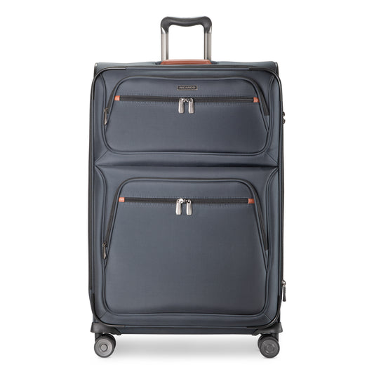 Product Image – Ricardo Beverly Hills Montecito 3.0 Large navy expandable spinner with two zip pockets and telescoping handle.