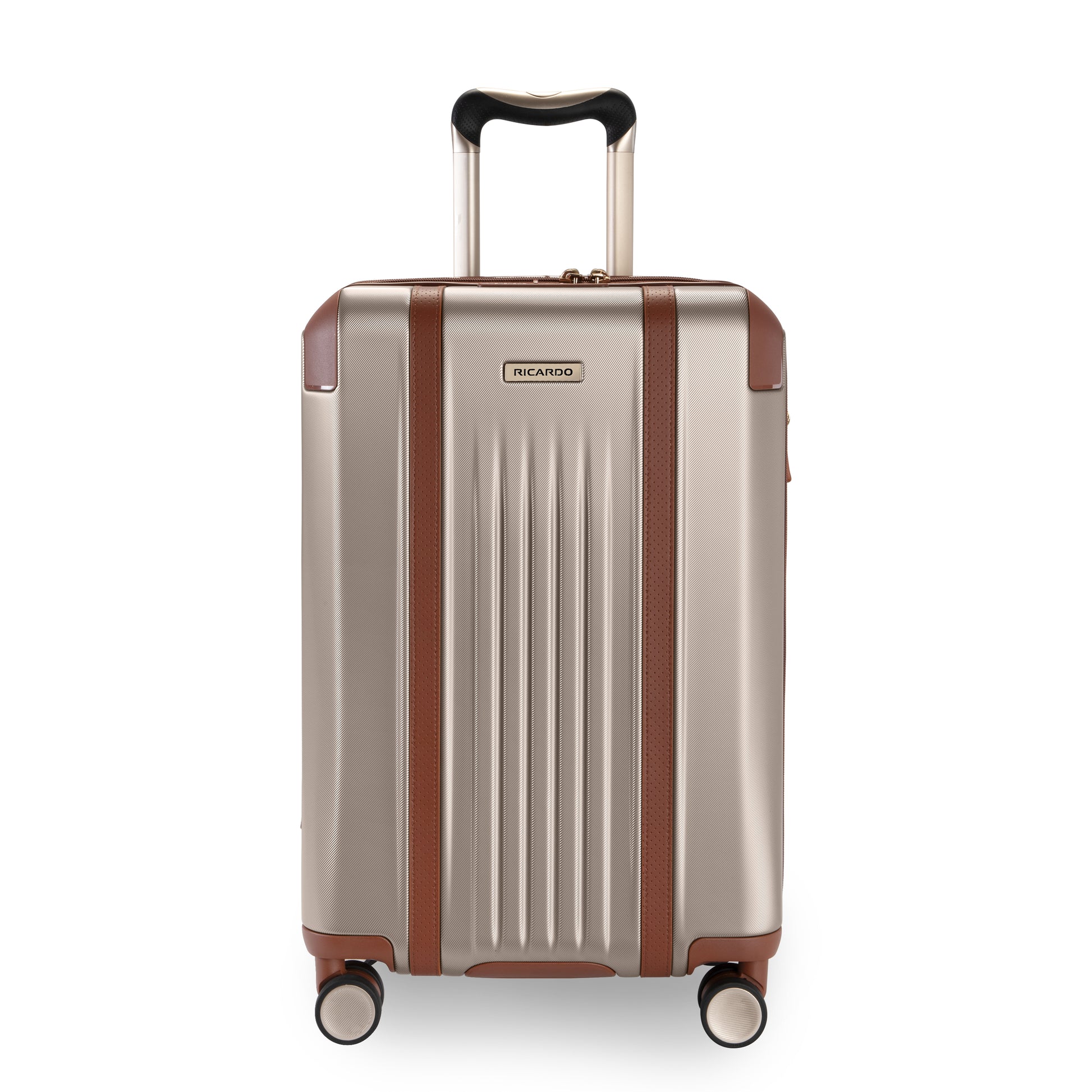 Ricardo Beverly Hills Montecito 2.0 21" beige hardside carry-on with brown trim, four wheels, telescopic handle.