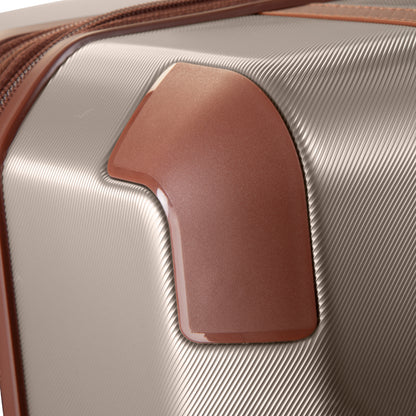 Close-up of Ricardo Beverly Hills Montecito 2.0 21" Hardside Spinner Carry-on's brown corner and beige texture.