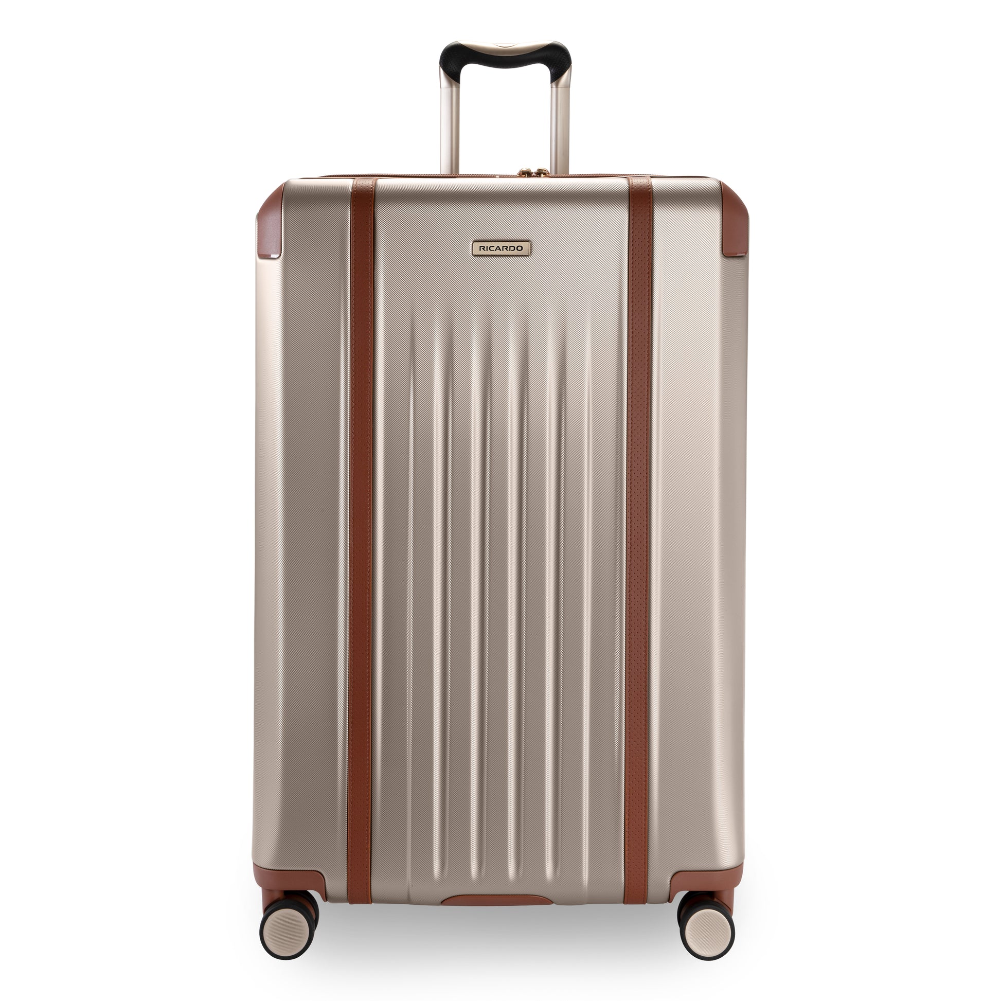 Ricardo Beverly Hills Montecito 2.0 29" Hardside Spinner with 4 wheels, vertical ridges, and brown accents.