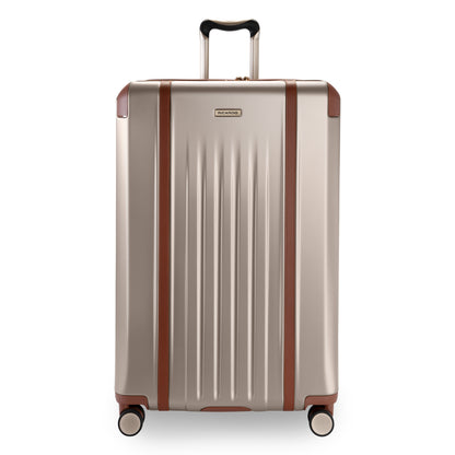 Ricardo Beverly Hills Montecito 2.0 29" Hardside Spinner with 4 wheels, vertical ridges, and brown accents.