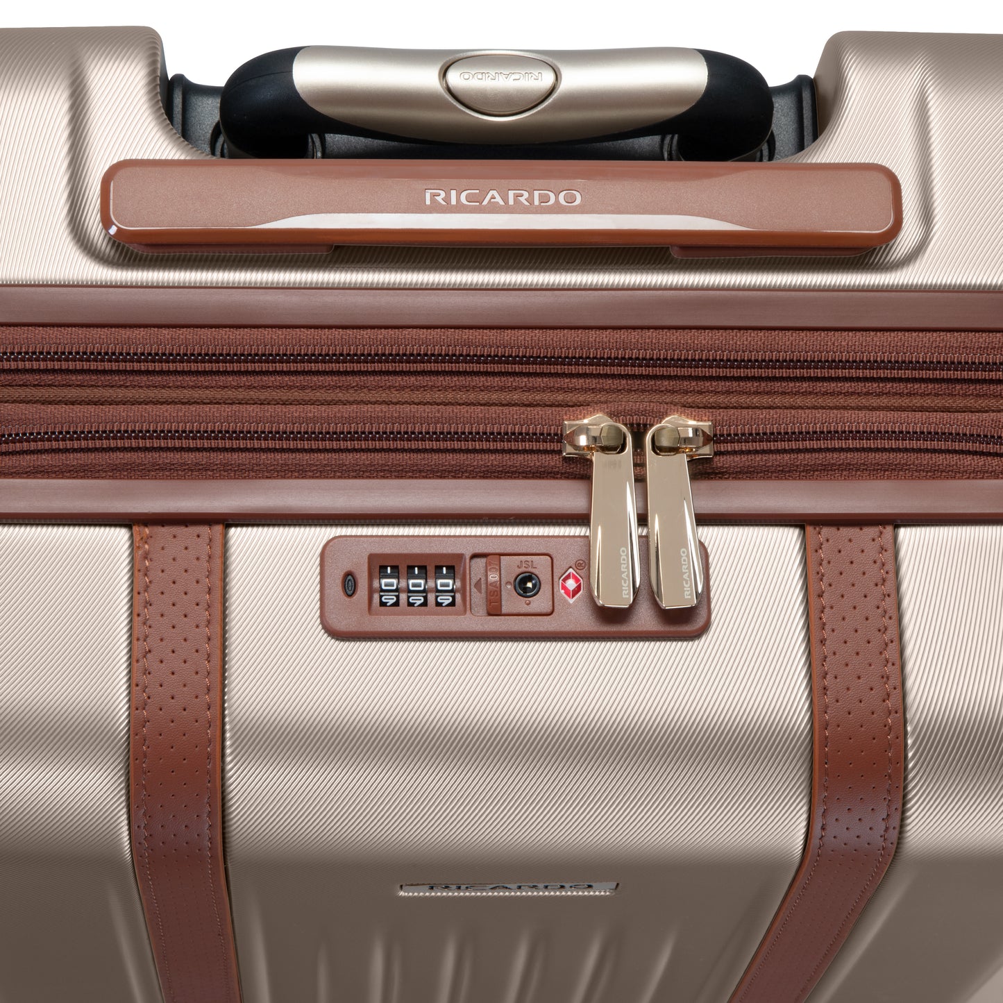 Close-up of Ricardo Beverly Hills Montecito 2.0 29" hardside spinner in beige with brown accents, lock, and zippers.