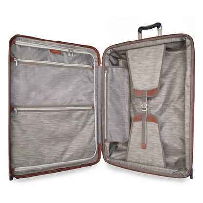 Ricardo Beverly Hills Montecito 2.0 29" Hardside Spinner open to show compartments, zip pockets, and straps.
