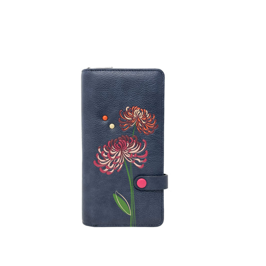 Product Image – The Espe Mae Clutch Wallet is a navy vegan wallet with red and pink floral embossing and a pink snap closure.