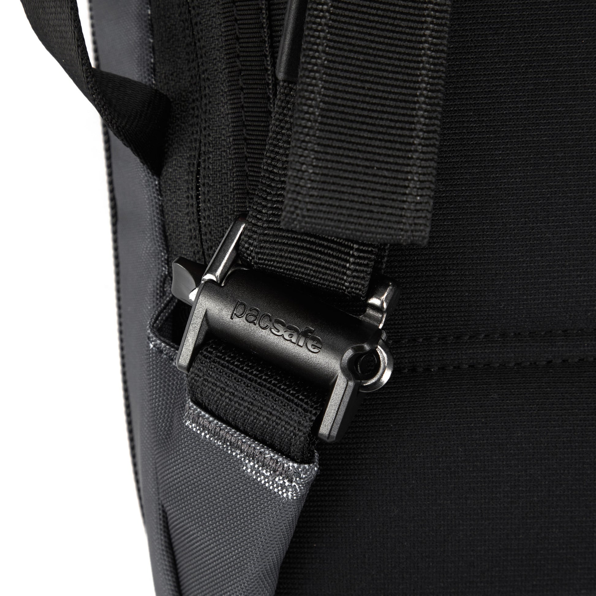 Close up of shoulder strap lock on the slate Pacsafe® X Anti-Theft 13-Inch Commuter Backpack