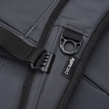 Close-up of the Pacsafe® EXP 28L Anti-Theft Backpack showing strap, zipper, and Pacsafe branding.