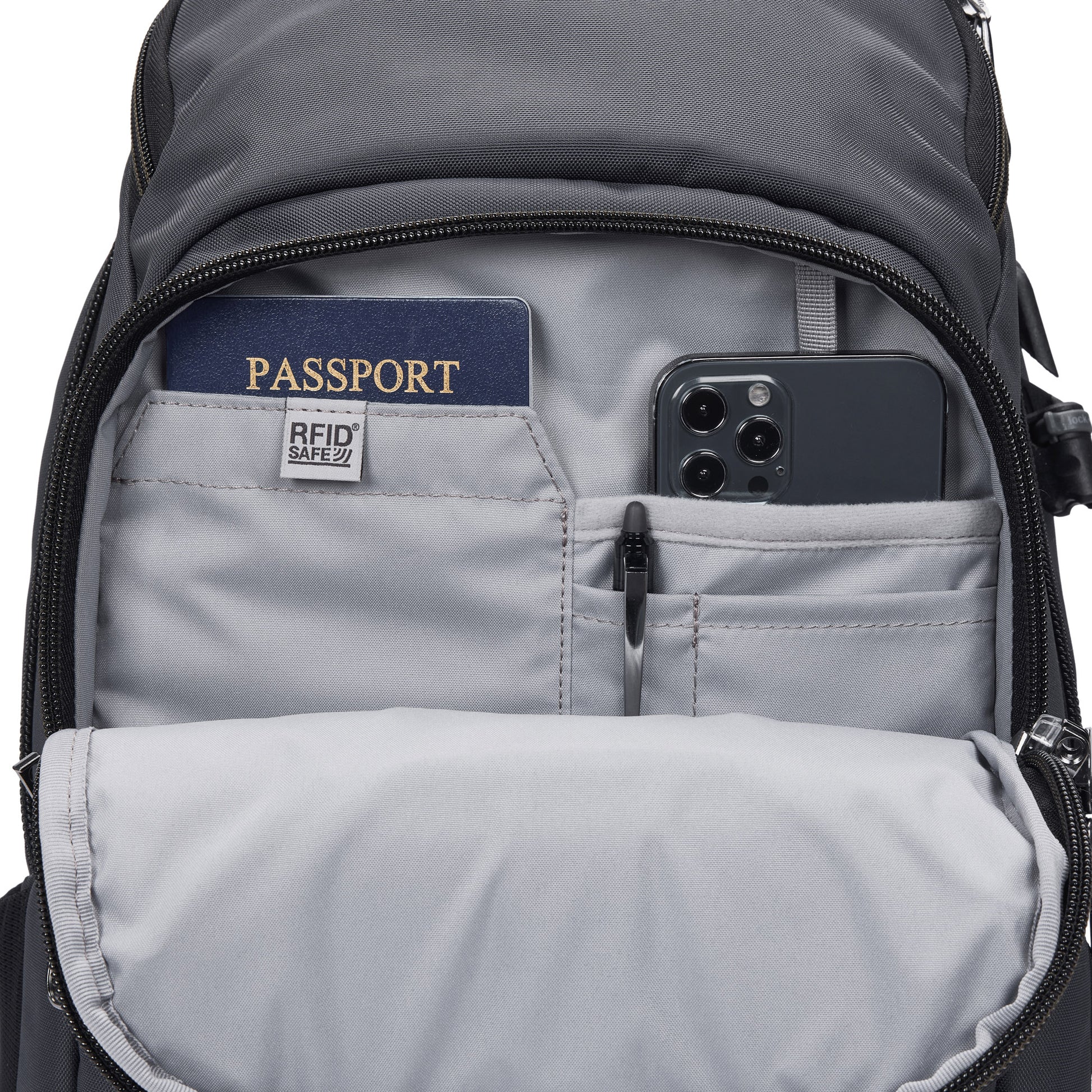Access your passport and smartphone separately in the Pacsafe® EXP 28L Anti-Theft Backpack’s pocket.