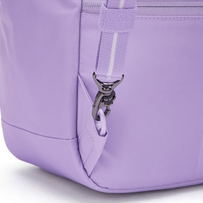 Close-up of Pacsafe® GO 15L Anti-theft Backpack, showing metal clasp attaching the shoulder strap.