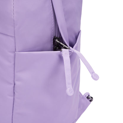 Close-up of a Pacsafe® GO 15L Anti-theft Backpack pocket, zipper and pull tab partially open.