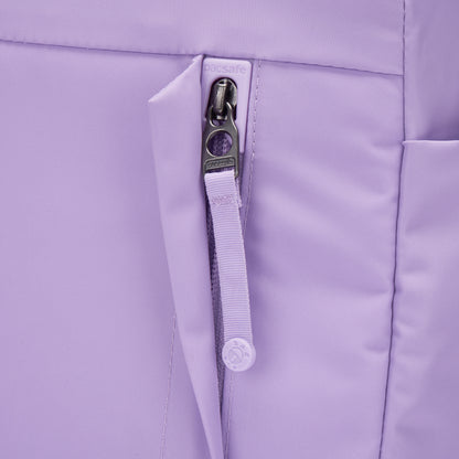 Close-up of Pacsafe® GO 15L Anti-theft Backpack with secure zippers and RFID blocking pocket.