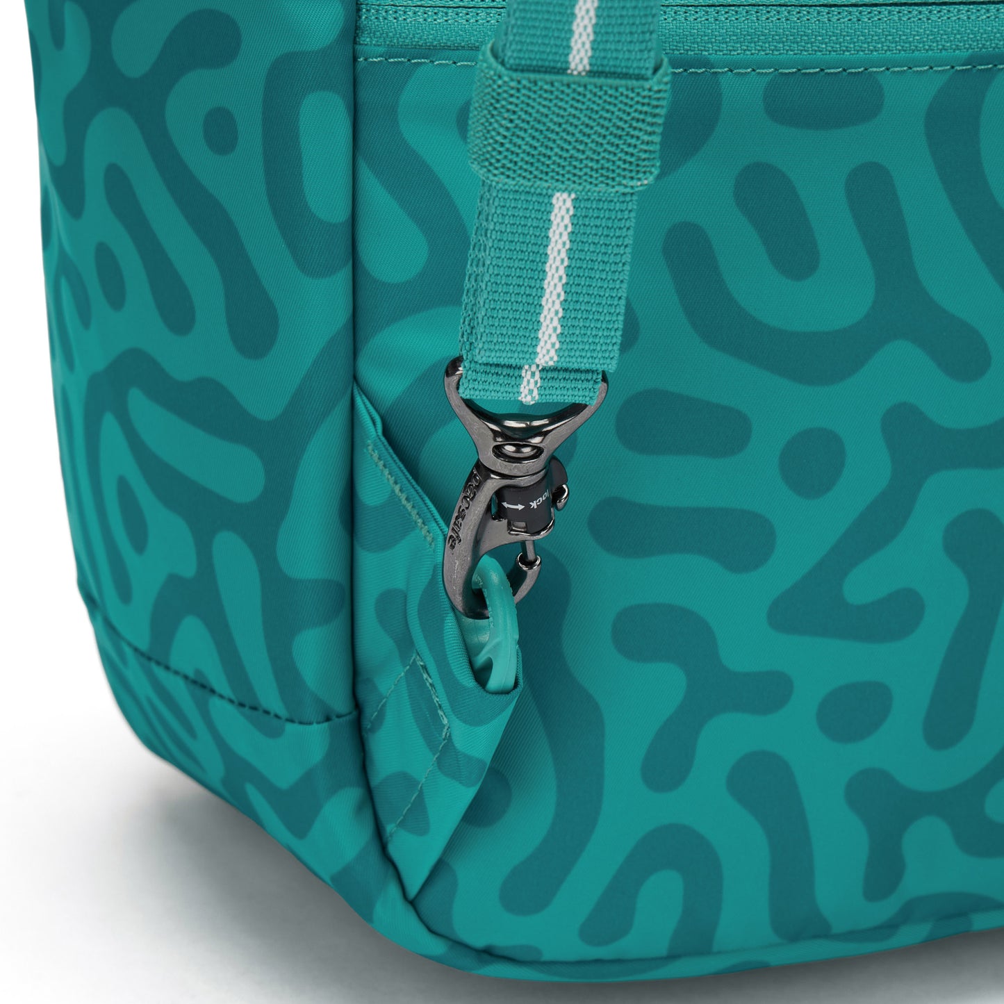 Close up of turn n lock clip on backpack strap.