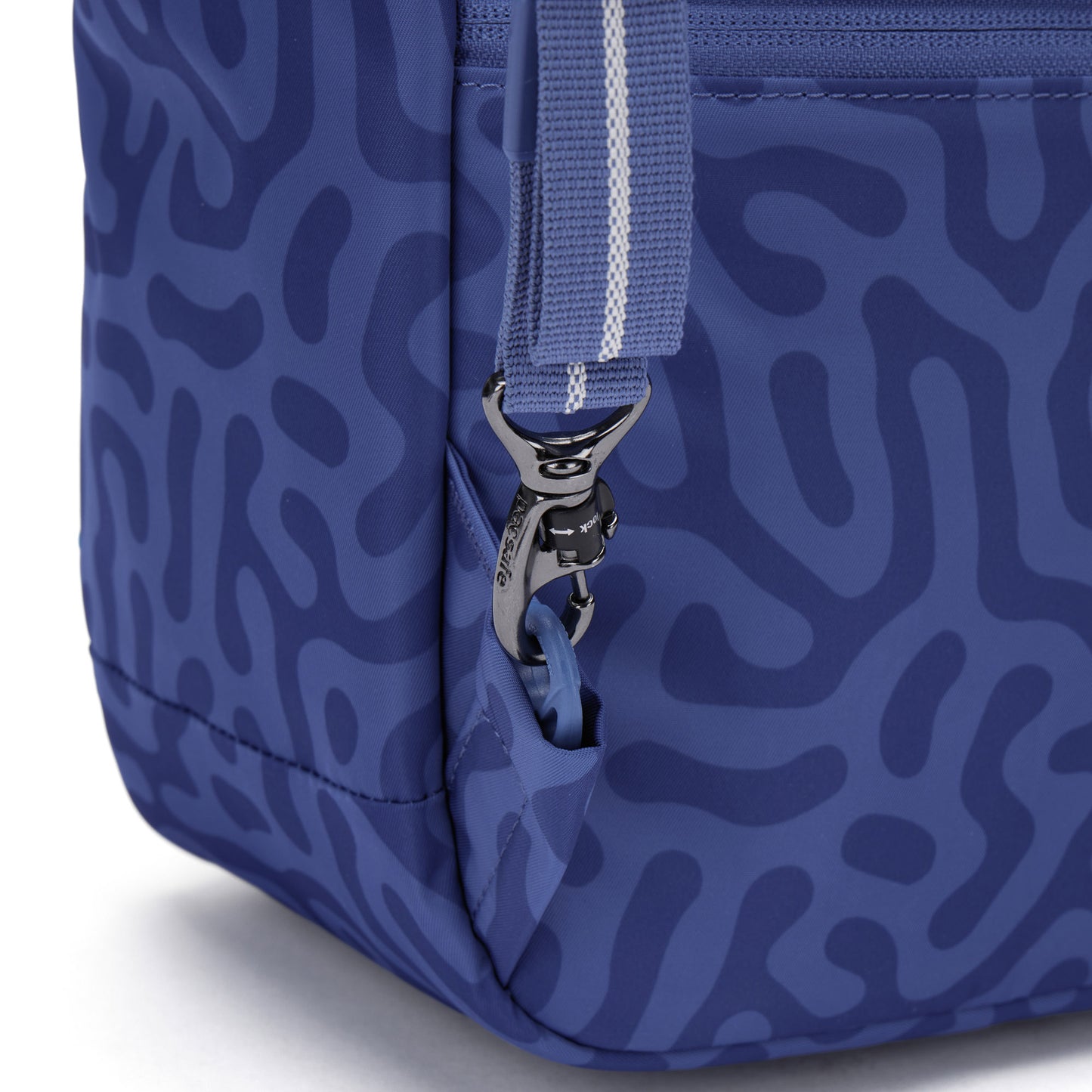 Close up of turn n lock clip on backpack strap.