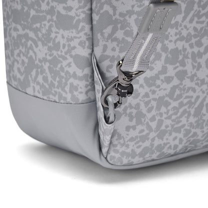 Close-up of Pacsafe® GO 25L Anti-theft Backpack in gray with metal clip securing the bottom zipper.