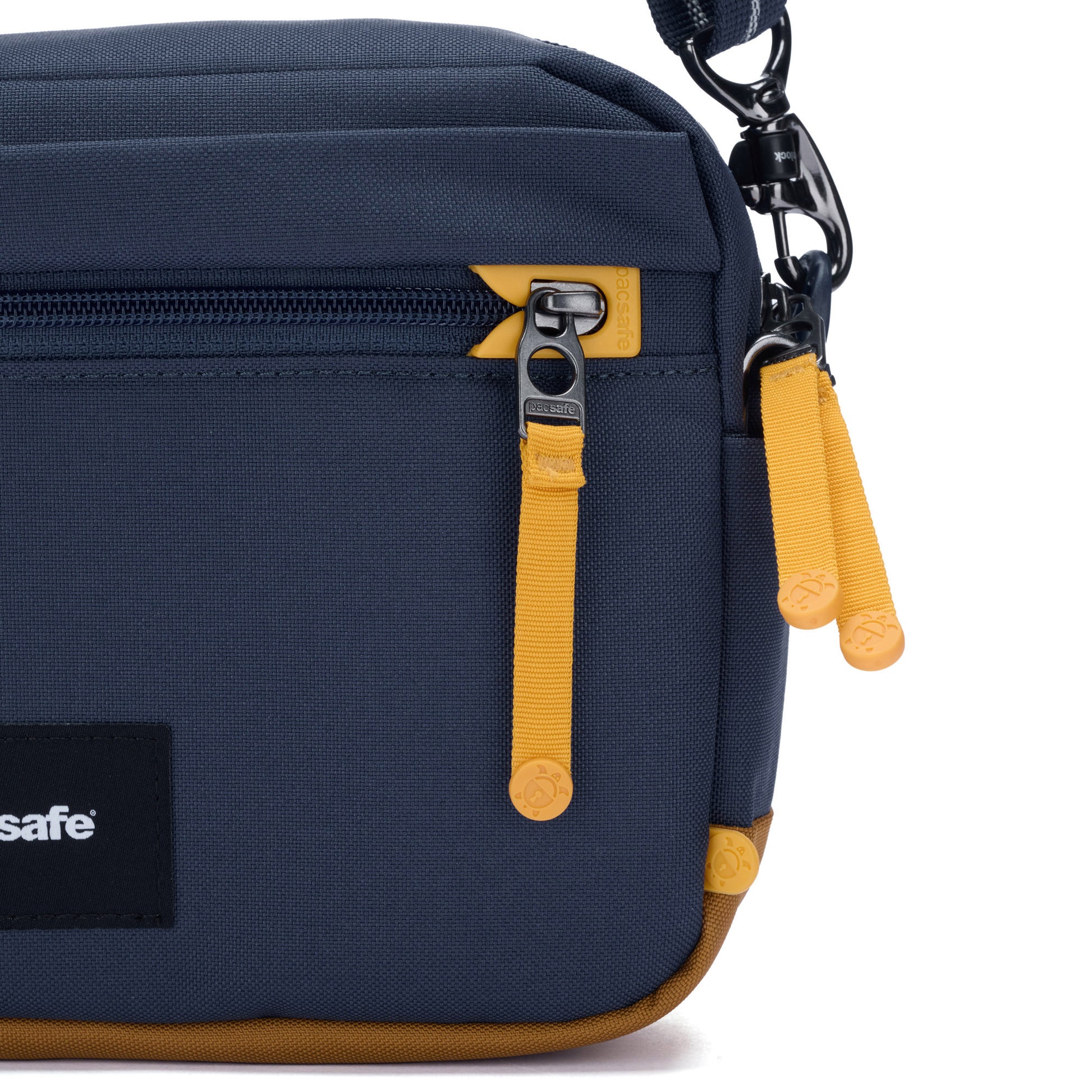 Pacsafe® GO Anti-Theft Crossbody Bag in coastal blue close up of yellow zipper pulls