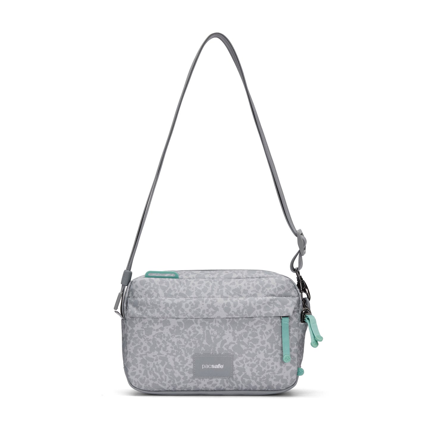 Pacsafe® GO Anti-Theft Crossbody Bag in light gray with green zippers, recycled polyester, on white background.