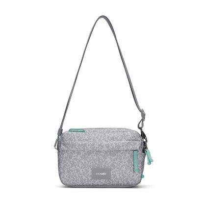 Pacsafe® GO Anti-Theft Crossbody Bag in light gray with green zippers, recycled polyester, on white background.