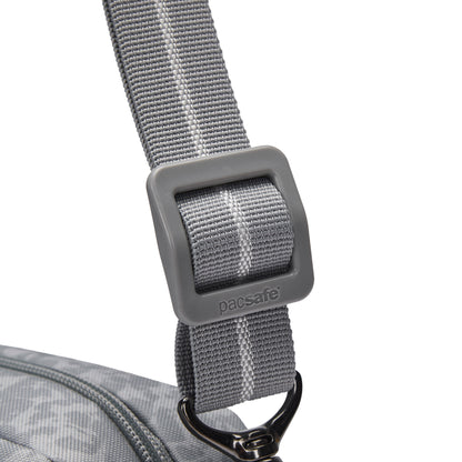 Close-up of a gray adjustable strap with buckle on the Pacsafe® GO Anti-Theft Crossbody Bag by Pacsafe.
