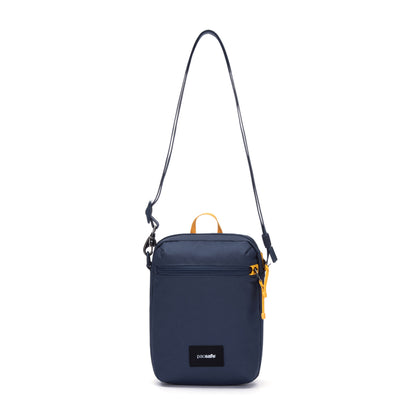 Pacsafe® GO Anti-Theft Festival Crossbody in coastal blue colour, front view with cut-resistant shoulder strap fully extended.