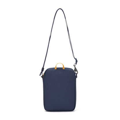 Pacsafe® GO Anti-Theft Festival Crossbody in coastal blue colour, front left side view with cut-resistant shoulder strap fully extended.