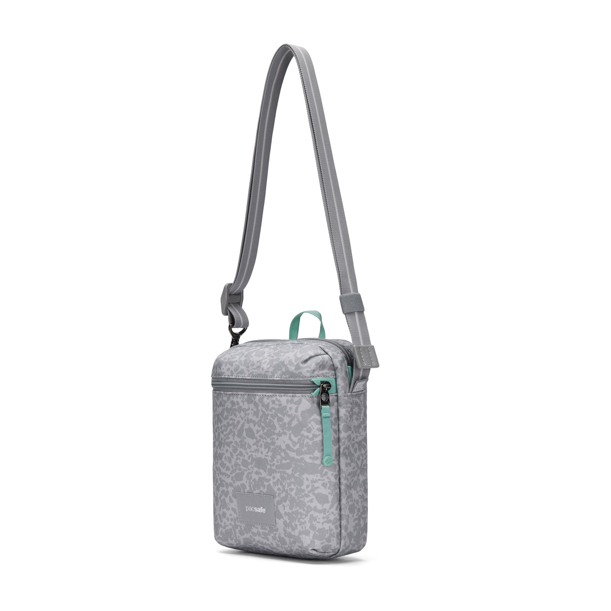 Pacsafe® GO Anti-Theft Festival Crossbody with teal zipper, RFID pocket & adjustable strap by Pacsafe.