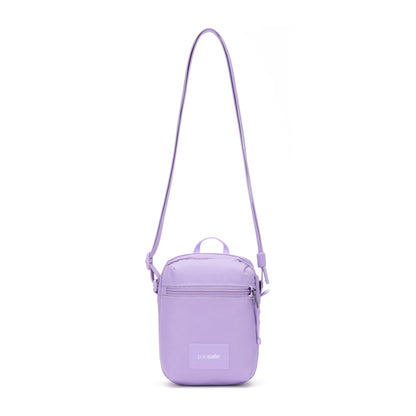 The Pacsafe® GO Anti-Theft Micro Crossbody is a small, rectangular lavender bag with RFID protection and an adjustable strap.