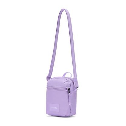 The Pacsafe® GO Anti-Theft Micro Crossbody is a small purple bag with RFID-blocking pocket and long strap.