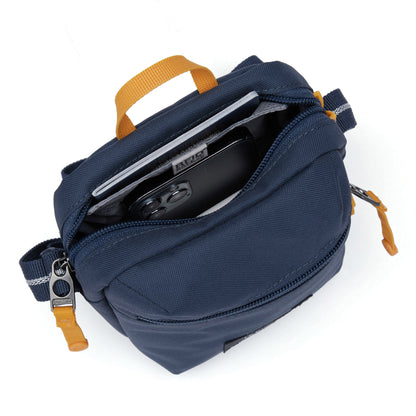 Pacsafe® GO Anti-Theft Micro Crossbody in blue inside view, fits passport and phone.