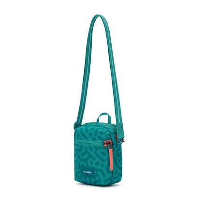 Pacsafe® GO Anti-Theft Micro Crossbody by Pacsafe: teal, abstract pattern, RFID pocket, adjustable strap.