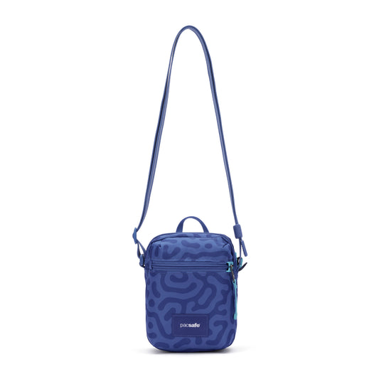 Product Image – Pacsafe® GO Anti-Theft Micro Crossbody in blue with abstract pattern, RFID pocket, and adjustable strap.