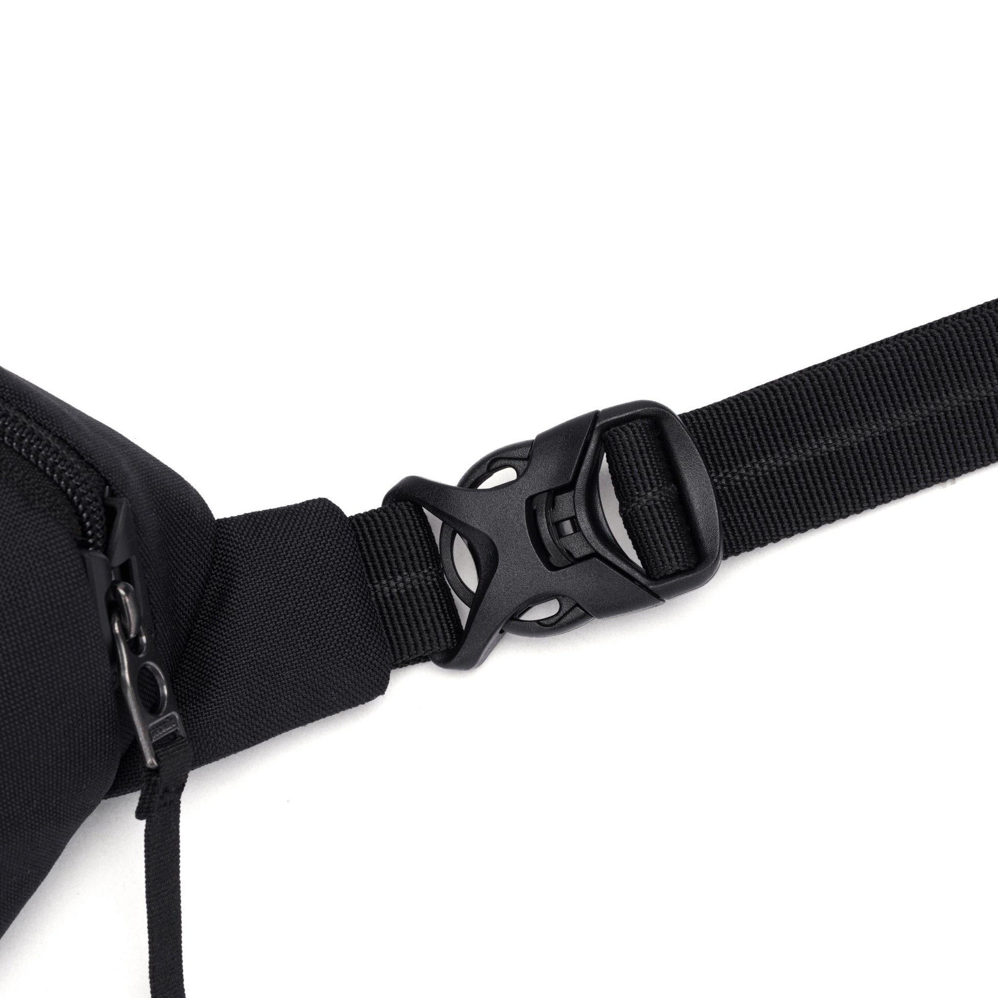 Close-up of the Pacsafe® GO Anti-Theft Micro Sling in black with adjustable strap, by Pacsafe.