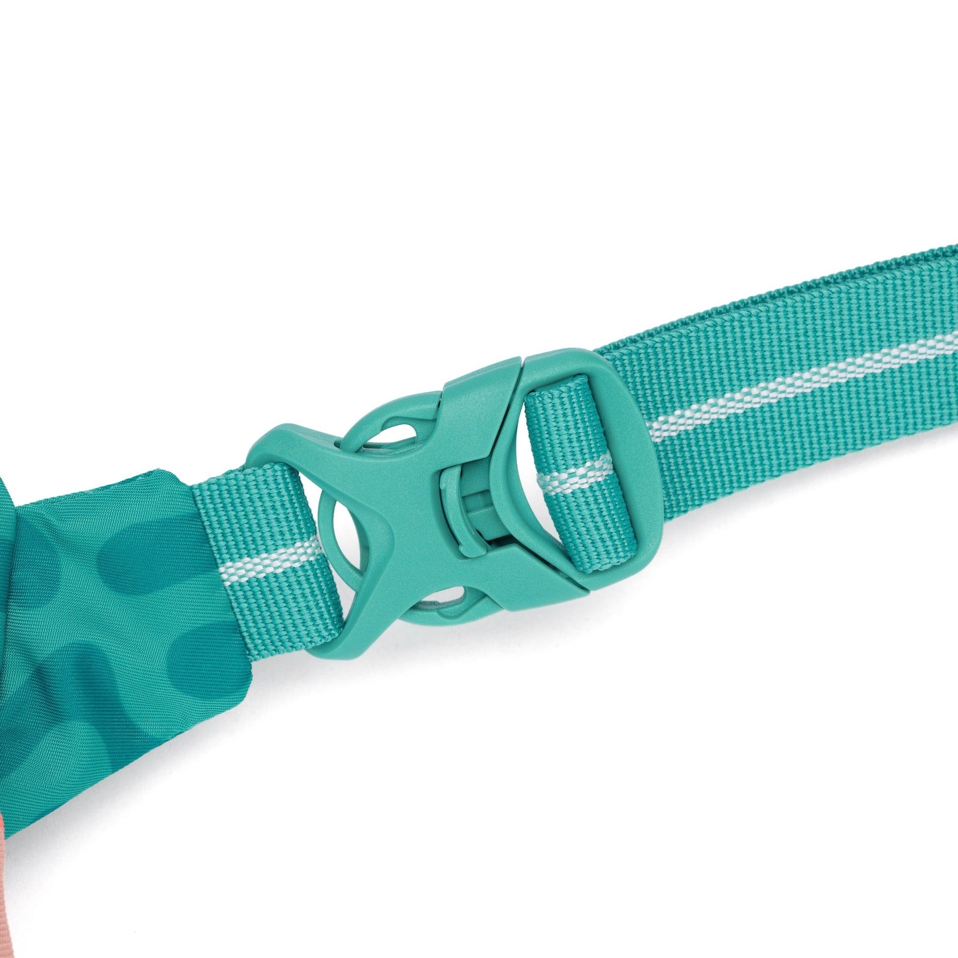 Close-up of the Pacsafe® GO Anti-Theft Micro Sling's teal buckle on a matching woven strap with white stripe.