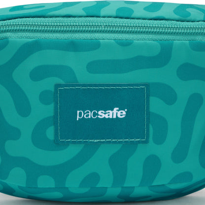 Teal Pacsafe® GO Anti-Theft Micro Sling with abstract pattern and front logo.