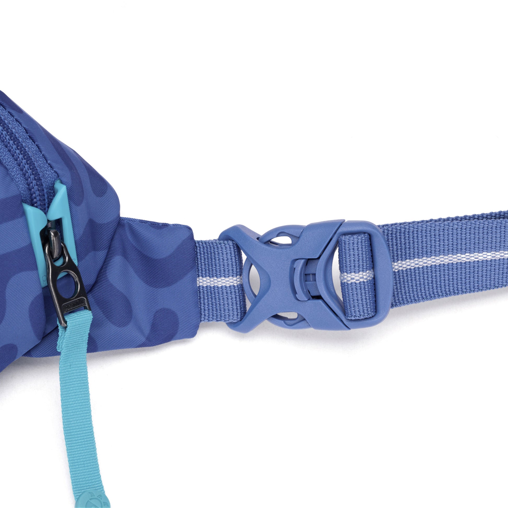 Close-up of Pacsafe® GO Anti-Theft Micro Sling's blue recycled polyester strap with a plastic buckle.