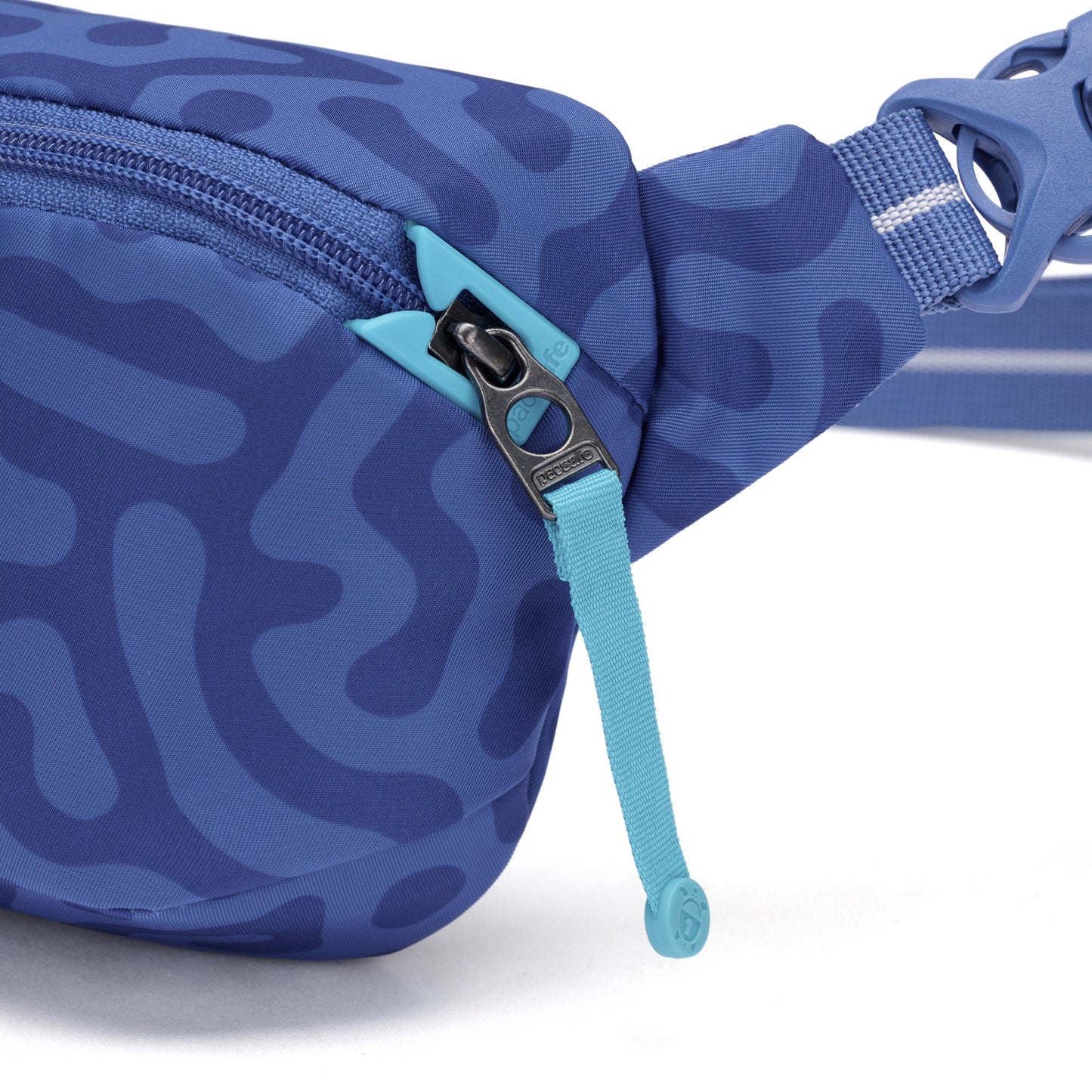 Close-up of the Pacsafe® GO Anti-Theft Micro Sling in blue pattern, made from recycled polyester with a zipper.