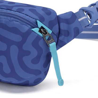 Close-up of the Pacsafe® GO Anti-Theft Micro Sling in blue pattern, made from recycled polyester with a zipper.
