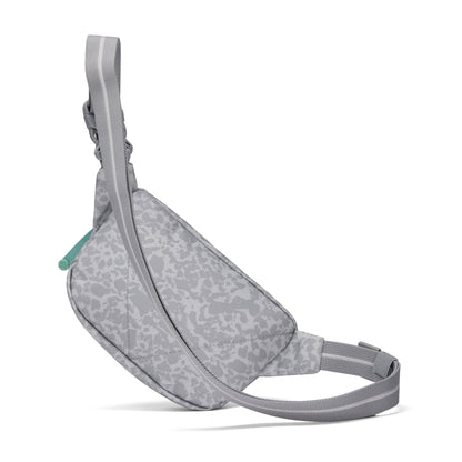 Pacsafe® GO Anti-Theft Micro Sling by Pacsafe: gray, patterned, recycled polyester, adjustable strap.