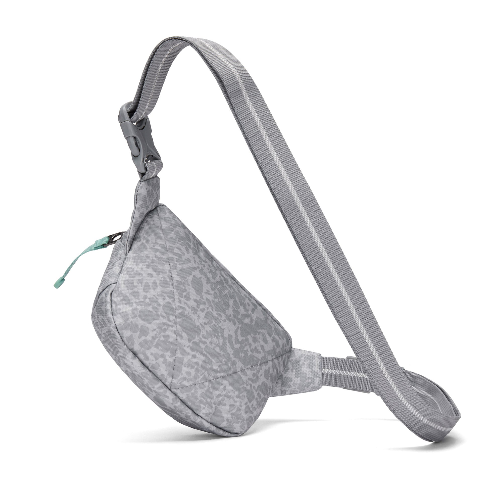 Pacsafe® GO Anti-Theft Micro Sling crossbody bag in light gray with pattern, zipper, and adjustable strap.