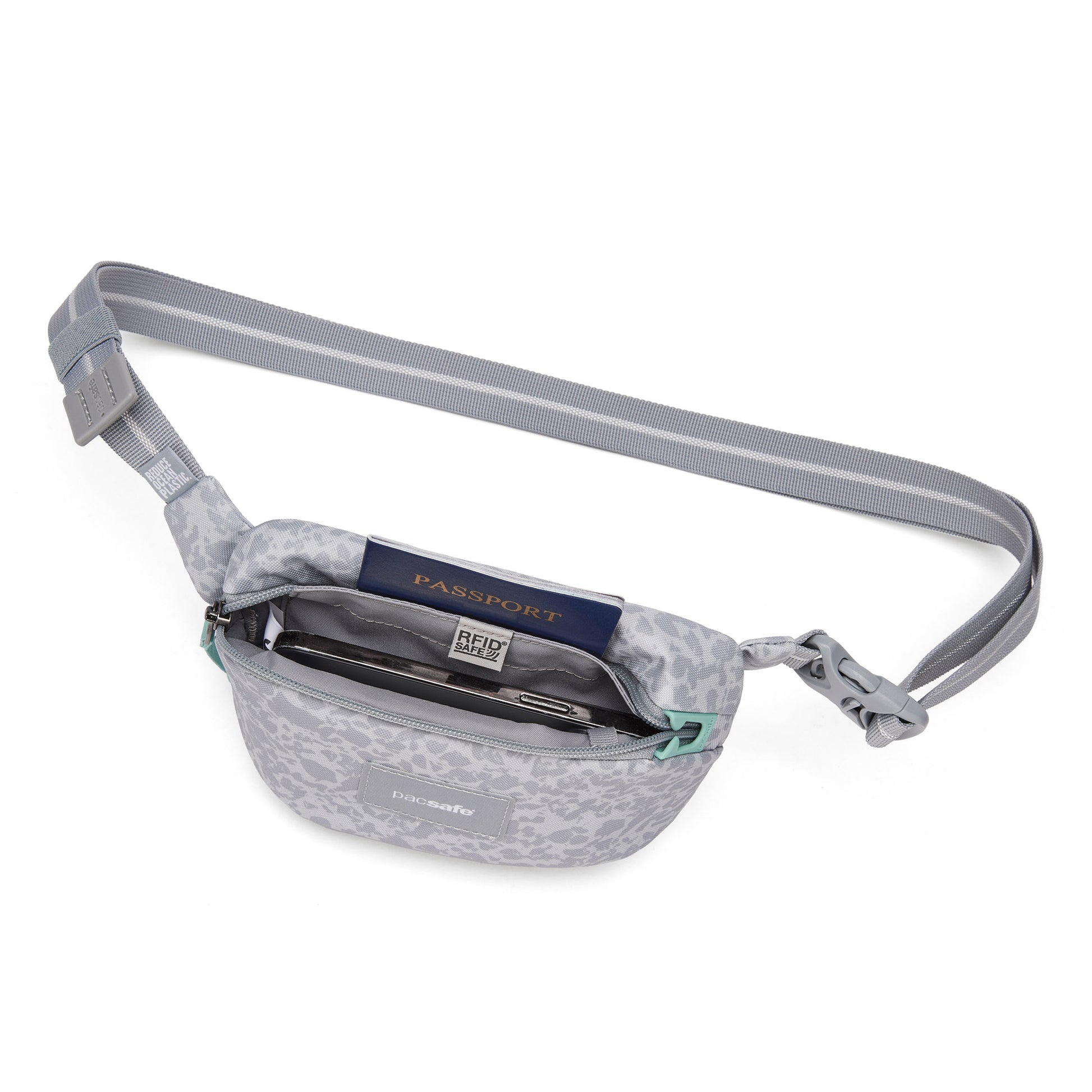 Pacsafe® GO Anti-Theft Micro Sling by Pacsafe, gray recycled poly, holds passport, phone & credit card visibly.