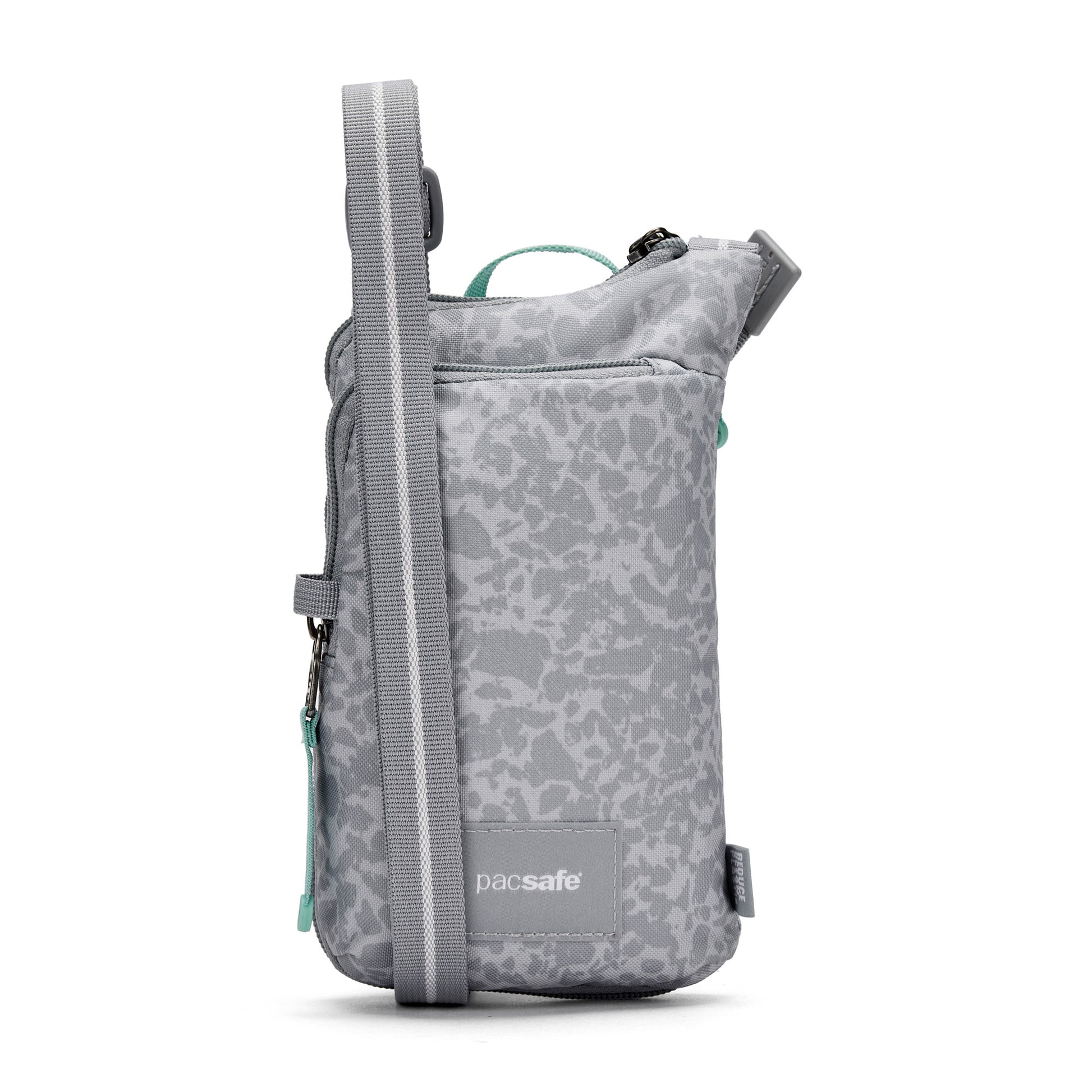 Pacsafe® GO Anti-Theft Tech Crossbody: gray pattern, adjustable strap, zip pocket, Pacsafe branding.