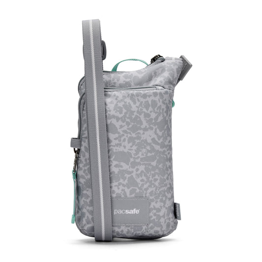 Product Image – Pacsafe® GO Anti-Theft Tech Crossbody: gray pattern, adjustable strap, zip pocket, Pacsafe branding.